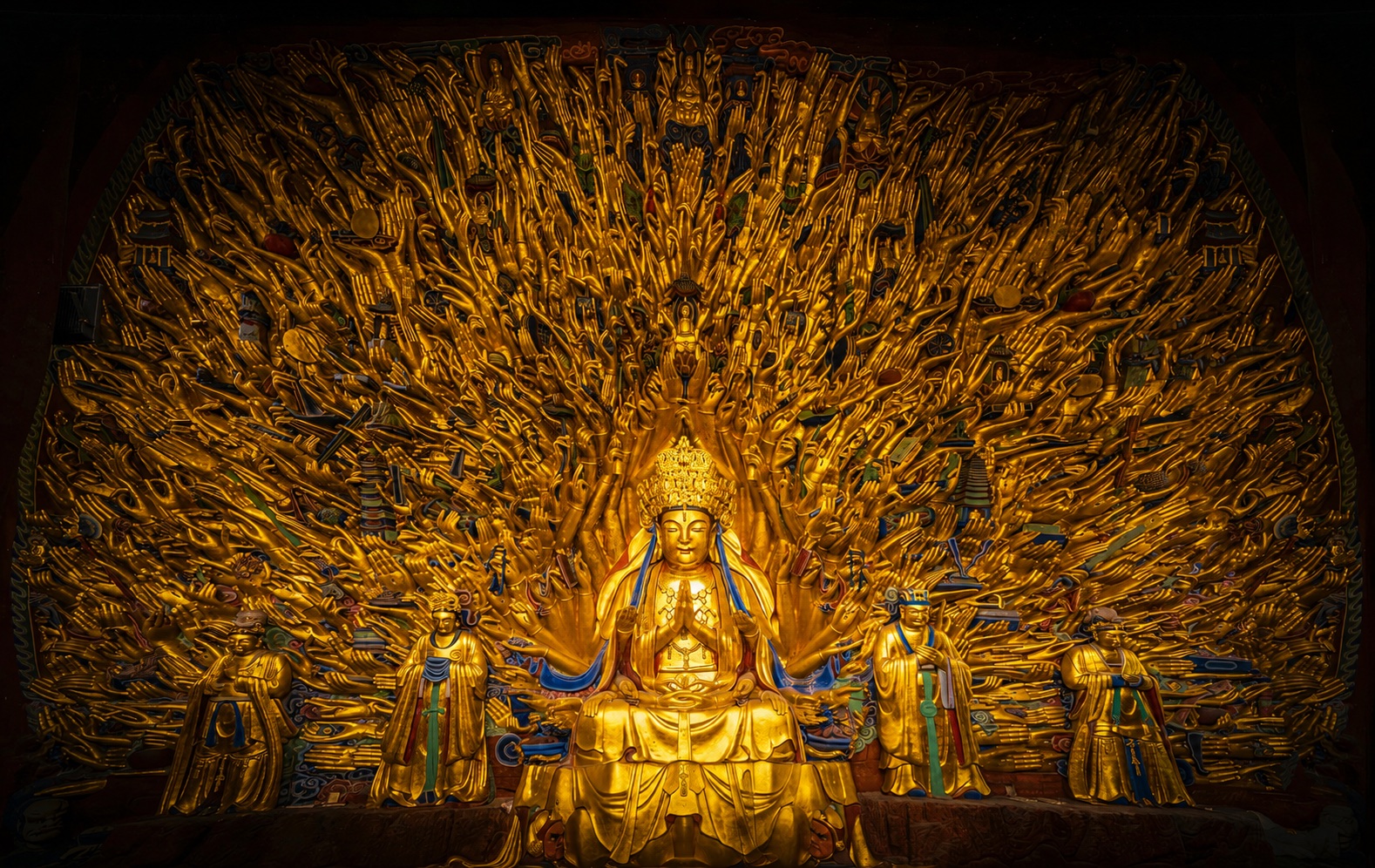 The gilded Thousand-Hand Guanyin at the Dazu Rock Carvings
